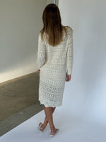 Modelbillede af ELIZA strik midi kjole, creme. Fra BySofieSønderby