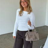 Modelbillede af MEADOW taske i beige. Fra BySofieSønderby