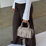 Modelbillede af MEADOW taske i beige. Fra BySofieSønderby