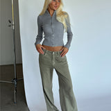Modelbillede af MONIKA zip i grå. Fra BySofieSønderby
